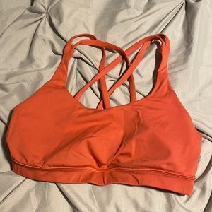 Gently used size 8 Lululemon orange sports bra, size 8